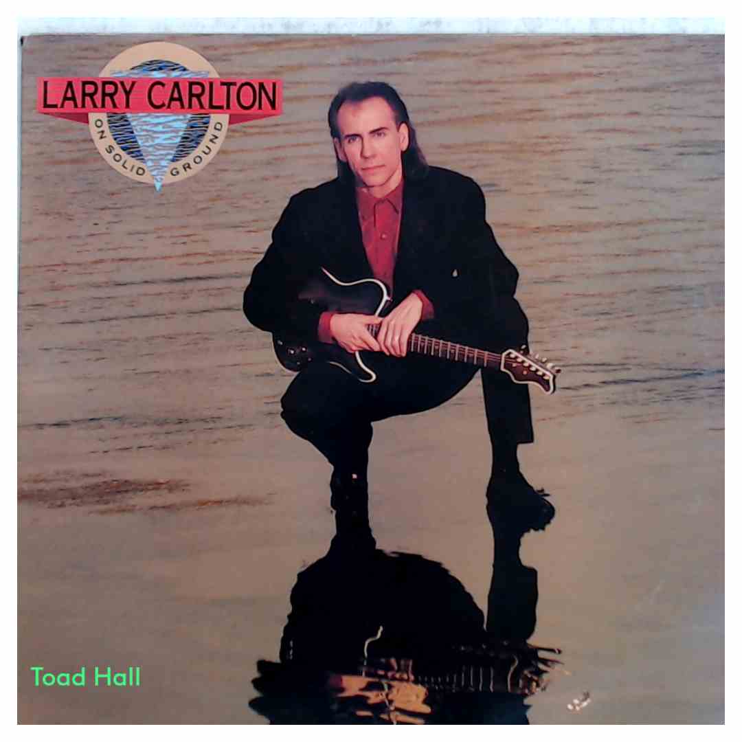 Larry Carlton - On Solid Ground - Used Vinyl
