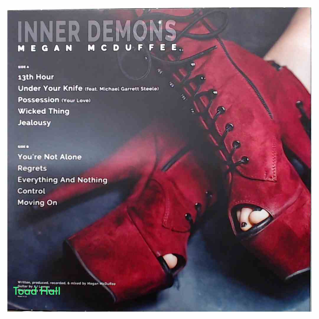 Megan McDuffee - Inner Demons (Teal Transparent w/ black splatter) - Used Vinyl